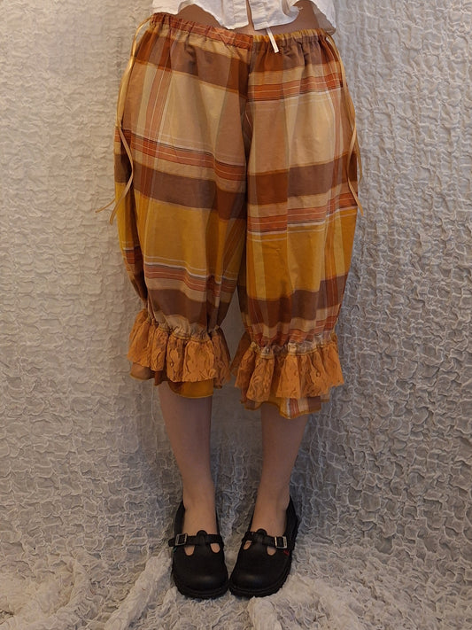 Szerokie spodnie z falbanami CHECKED