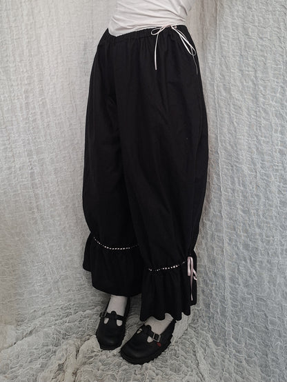 Szerokie spodnie z falbanami black/pink