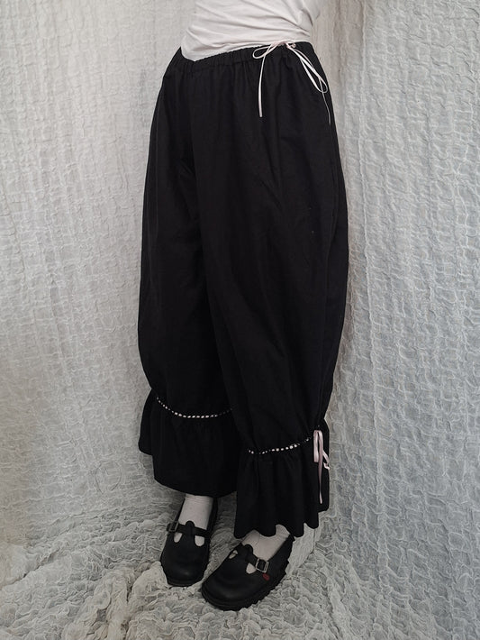 Szerokie spodnie z falbanami black/pink